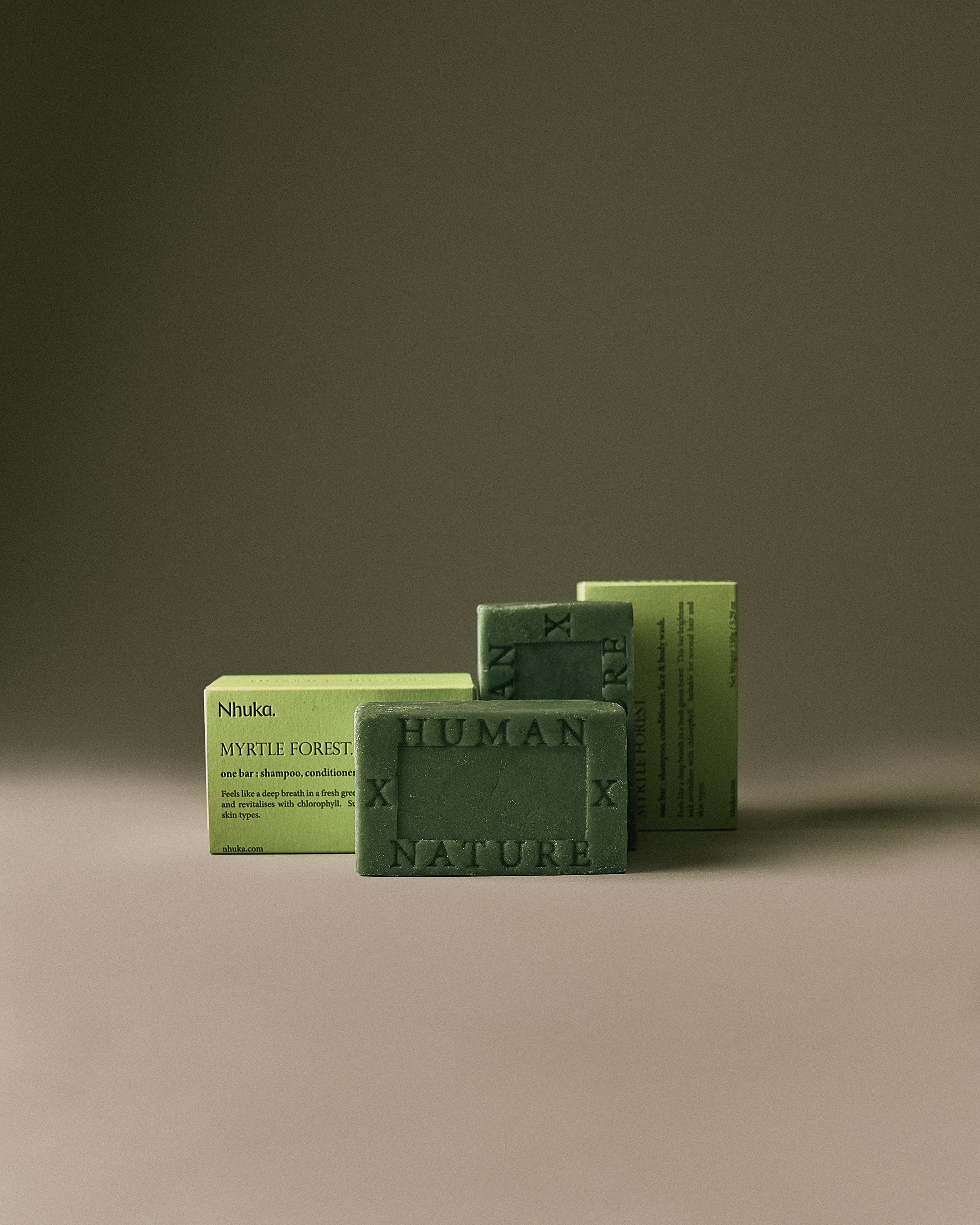 Nhuka Myrtle Forest One Bar with sustainable packaging. Handmade in Australia, pH-balanced, sulfate-free, silicone-free, and organic. Fresh green scent with native lemon myrtle and honey myrtle. No exfoliant. Designed for hair, face, and body.