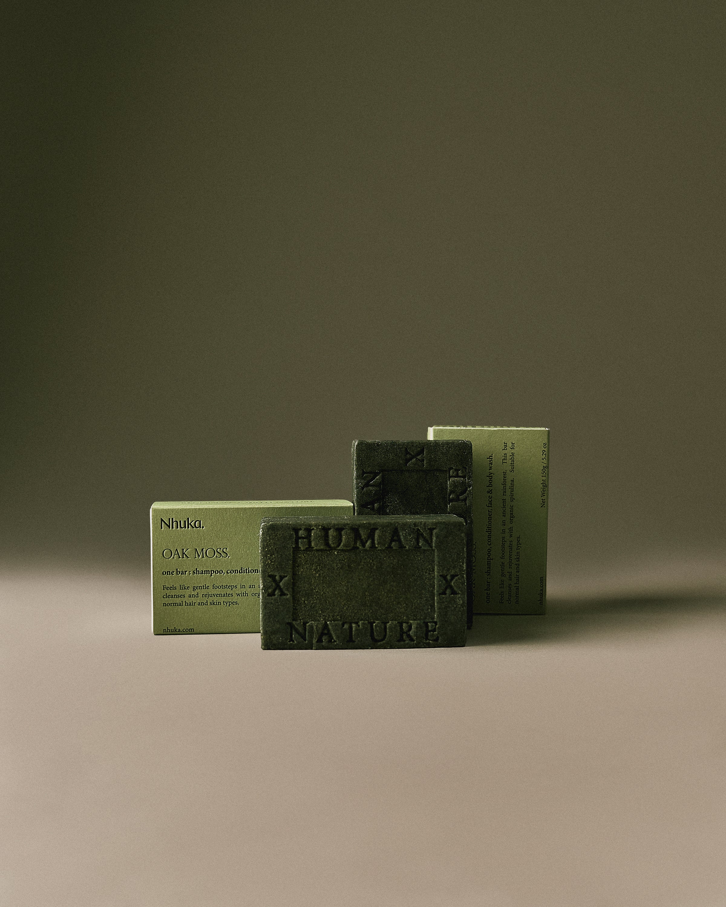 Nhuka Oak Moss Organic One Bar with organic spirulina. Handmade in Australia, pH-balanced, sulfate-free, silicone-free for hair, face, and body. Features a grounding, forest-like scent.