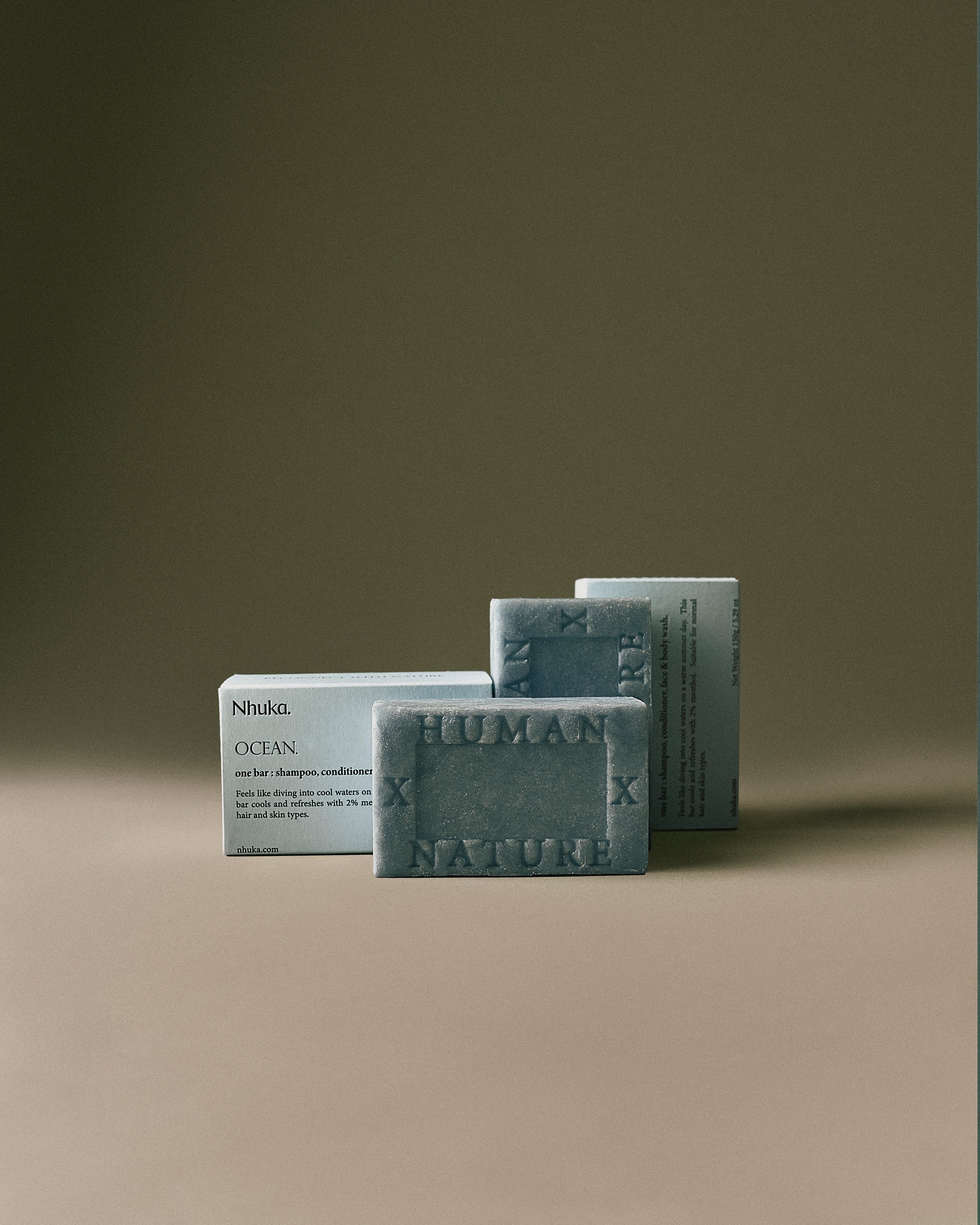 Nhuka Ocean One Bar with cooling menthol, shown with sustainable packaging. Handmade in Australia, pH-balanced, sulfate-free, silicone-free, and organic. Designed for hair, face, and body with a refreshing scent.