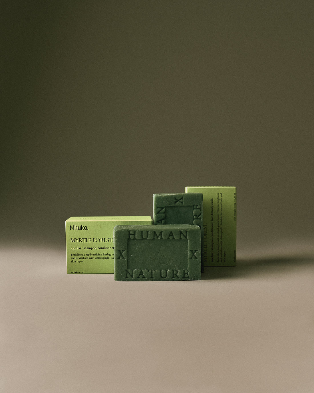 Nhuka Myrtle Forest One Bar with sustainable packaging. Handmade in Australia, pH-balanced, sulfate-free, silicone-free, and organic. Fresh green scent with native lemon myrtle and honey myrtle. No exfoliant. Designed for hair, face, and body.