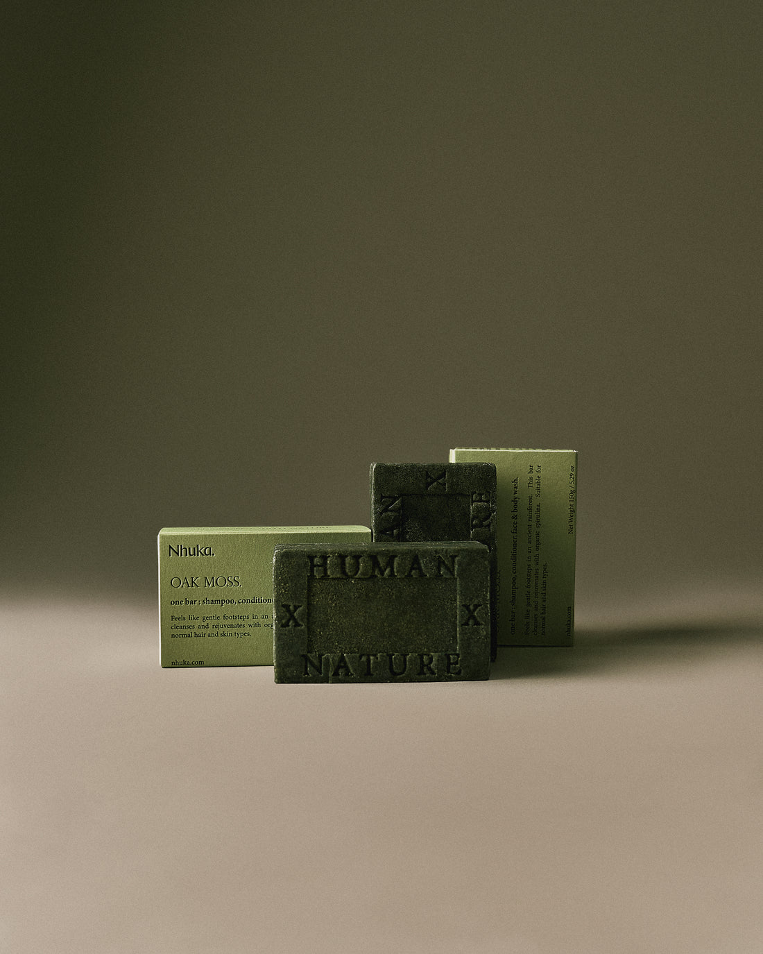 Nhuka Oak Moss Organic One Bar with organic spirulina. Handmade in Australia, pH-balanced, sulfate-free, silicone-free for hair, face, and body. Features a grounding, forest-like scent.