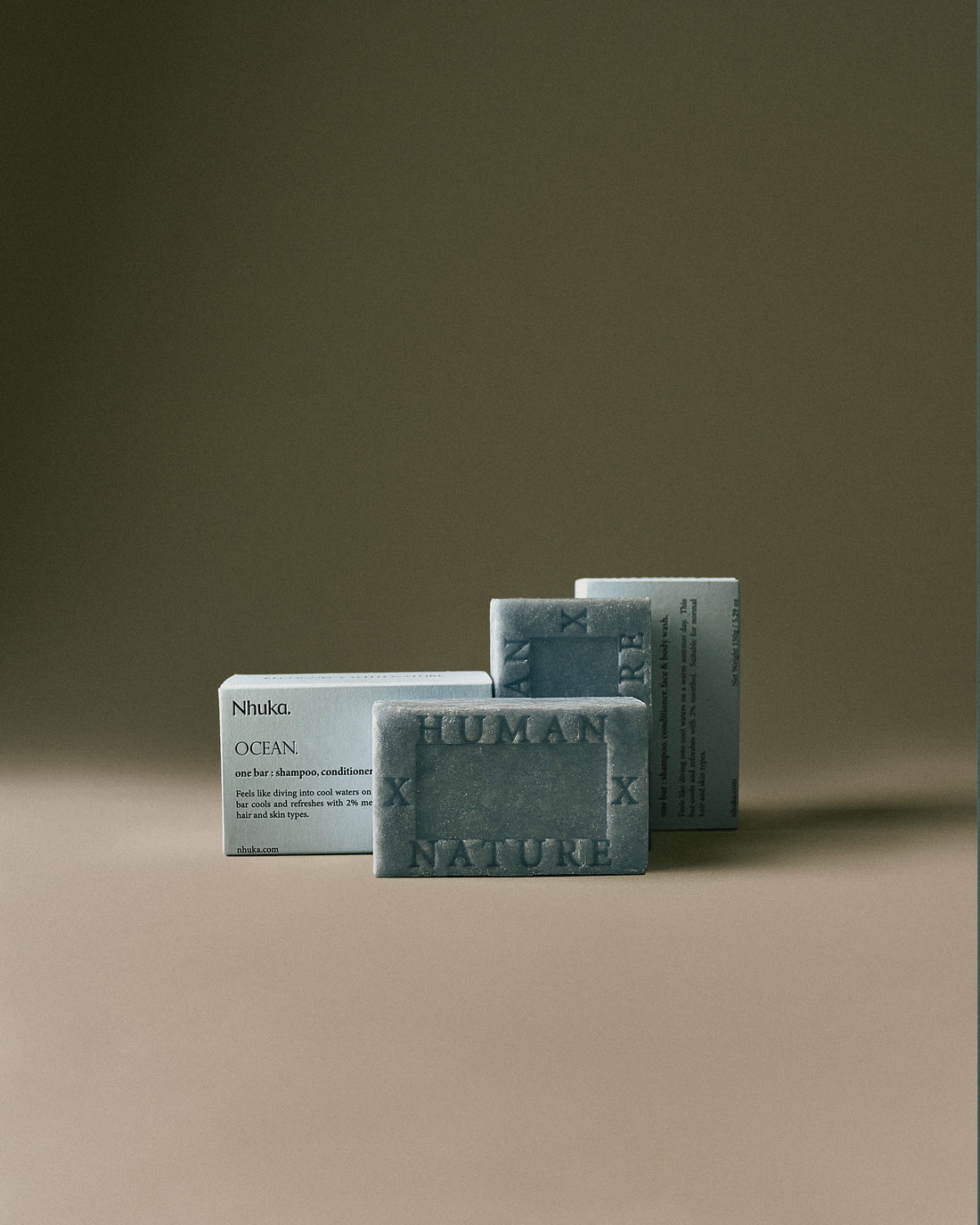 Nhuka Ocean One Bar with cooling menthol, shown with sustainable packaging. Handmade in Australia, pH-balanced, sulfate-free, silicone-free, and organic. Designed for hair, face, and body with a refreshing scent.