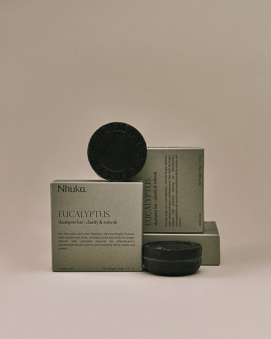 Nhuka eucalyptus shampoo bar with FSC-certified packaging. Handmade in Australia, sulfate-free and designed to clarify oily scalp with activated charcoal.