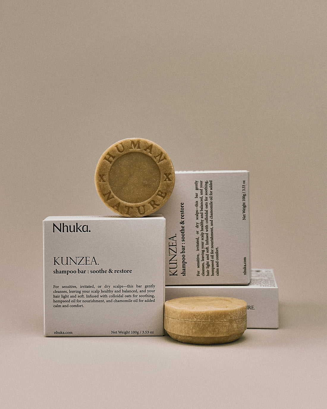 Nhuka kunzea shampoo bar displayed with FSC-certified packaging. Handmade in Australia and pH-balanced, ideal for irritated or dry scalps.