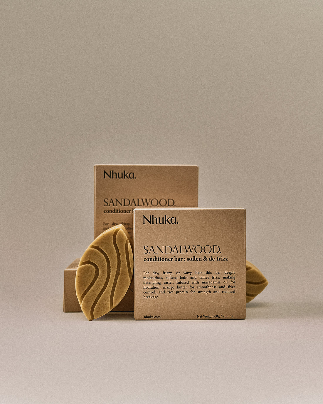 Nhuka sandalwood conditioner bar with FSC-certified packaging. Handmade in Australia, pH-balanced and silicone-free. Designed to moisturise, detangle, and reduce frizz in dry or wavy hair.